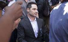 Carl Pistorius leaves the High Court in Pretoria after the reading of judgment in the Oscar Pistorius murder trial on 11 September 2014. Picture: Christa Eybers/EWN.