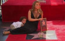 Mariah Carey gets a hollywood star and her child wants a share of the spot light. Picture: Screengrab/CNN