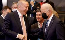 FILE: US President Joe Biden (R) speaks with Turkey's President Recep Tayyip Erdogan prior to a plenary session of a NATO summit at the North Atlantic Treaty Organization (NATO) headquarters in Brussels, on 14 June 2021. Picture: AFP