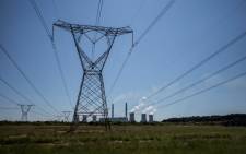 FILE: Power lines leaving Eskom’s Duvha power station, 15km east of Witbank. Picture: AFP.