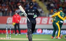 New Zealand’s Martin Guptill is run out for 34 runs during the semi-final Cricket World Cup match between New Zealand and South Africa played at Eden Park in Auckland on 24 March, 2015. Picture: AFP.