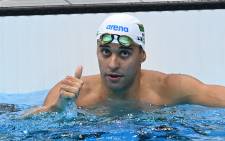 South Africa's Chad Le Clos reacts after winning a semi-final of the men's 200m butterfly swimming event during the Tokyo 2020 Olympic Games at the Tokyo Aquatics Centre in Tokyo on 27 July 2021.