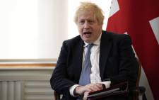 FILE: Former Britain's Prime Minister Boris Johnson speaks during a meeting with the Ukrainian President (not in picture) at the Munich Security Conference (MSC) in Munich, southern Germany, on 19 February 2022. Picture: Matt Dunham/POOL/AFP