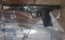 A gun and bullets that were seized by police in Bishop Lavis. Picture: SAPS.