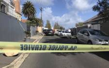 Police and forensic experts comb the scene of a shooting after prominent advocate Pete Mihalik was gunned down outside a Cape Town school on 30 October 2018. Picture: Kaylynn Palm/EWN