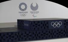 The podium to be used for the medal ceremonies at the Tokyo 2020 Olympics Games is seen during an event to mark 50 days to the opening ceremony, at Ariake Arena in Tokyo on 3 June 2021. Picture: Issei Kato/AFP