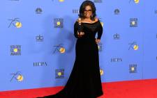 Oprah Winfrey poses with the Cecil B. DeMille Award in the press room during The 75th Annual Golden Globe Awards at The Beverly Hilton Hotel on 7 January, 2018. Picture. AFP