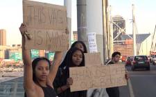 Members of the South African Students Council of Wits gathered on Nelson Mandela Bridge in Johannesburg to voice their concerns about gender-based violence and murders that have been highlighted in the news recently. Picture: Louise McAuliffe/EWN