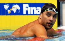 Chad Le Clos reacts after winning the men's 200m butterfly final during the FINA Swimming World Cup 2014 at Tokyo Tatsumi International Swimming Center in Tokyo, Japan, 28 October 2014. Picture:EPA/KIYOSHI OTA.