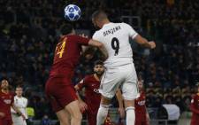 Real Madrid's Karim Benzema wins the ball against his Roma opponent during their Uefa Champions League clash in Rome on 27 November 2018. Picture: @realmadriden/Twitter