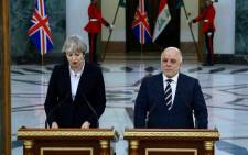 A picture released by the Iraqi Prime Minister's office on 29 November, 2017 show Prime Minister Haider al-Abadi (R) delivering a press statement with British Prime Minister Theresa May in Baghdad. Picture: AFP.