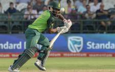 FILE: South Africa's Temba Bavuma watches the ball after playing a shot during the first one day international (ODI) cricket match between South Africa and England at The Newlands Cricket Stadium in Cape Town on 4 February 2020. Picture: AFP
