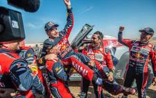 Carlos Sainz is hoisted up by his competitors after winning the 2020 Dakar Rally on 17 January 2020. Picture: @CSainz_oficial/Twitter