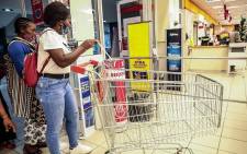 Customers have started trickling into Shoprite Diepsloot for their Black Friday discounted deals. There are no queues as compared to 2019. Picture: Abigail Javier/EWN