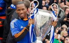 Didier Drogba with the trophy Chelsea won at the EUFA Champions League. Picture: AFP