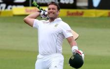South Africa's Jacques Kallis celebrates his century to become the third leading run scorer of all time during Day 4 of the second and final cricket Test match between India and South Africa at the Sahara Stadium Kingsmead in Durban on December 29, 2013. Picture: AFP.