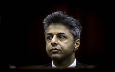 FILE: Shrien Dewani sits in the Western Cape High Court docks, waiting for the first day of his trial to begin. Picture: EWN.