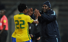 Mamelodi Sundowns' Percy Tau (L) celebrates his goal with Sundowns coach Pitso Mosimane during the CAF2016 Champions league match between Zamalek and Mamelodi Sundown at Lucas Moripe Stadium on July 27, 2016 in Pretoria. Picture: AFP