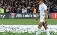 France's captain Thierry Dusautoir walks on the pitch after the 2011 Rugby World Cup final match against New Zealand on 23 October 2011. Picture: AFP