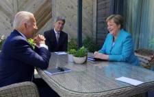 US President Joe Biden with German Chancellor Angela Merkel at the G7 Summit in Cornwall, England in June 2021. Picture: Twitter/@POTUS