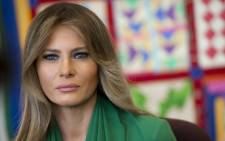 FILE: US First Lady Melania Trump talks with students during a visit with Jordan's Queen Rania to the Excel Academy Public Charter School in Washington on 5 April 2017. Picture: AFP.