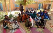 Survivors of the jihadist attack in Zaroumadareye sit at the hospital in Ouallam, Niger, on January 9, 2021. Picture: Souleymane Ag Anara / AFP
