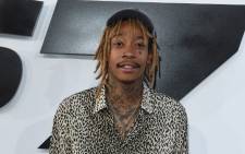 Recording artist Wiz Khalifa attends the premiere of ‘Furious 7’ held at the TCL Chinese Theatre in Hollywood, California on 1 April, 2015. Picture: AFP.