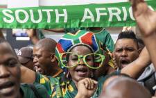 Fans gather at OR Tambo, singing and dancing as they welcome the national rugby team home. Picture: Thomas Holder/EWN.
