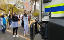 Protesters outside the Zimbabwean High Commission in Pretoria have come out in support of Zimbabwean following reports of human  right violations. Picture: Abigail Xavier/EWN