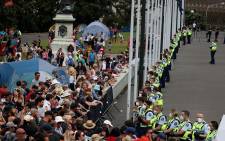 Police withdraw from their line and fall back to the front of Parliament buildings on the third day of demonstrations against COVID-19 restrictions, inspired by a similar demonstration in Canada, in Wellington on 10 February 2022. Picture: Marty Melville / AFP