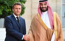 FILE: France's President Emmanuel Macron greets Saudi Crown Prince Mohammed bin Salman as he arrives at presidential Elysee Palace in Paris on July 28, 2022. Picture: AFP