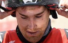 US' biker Ricky Brabec reacts at the end of the Stage 7 of the Dakar 2019 around San Juan de Marcona, Peru, on 14 January 2019. Picture: AFP
