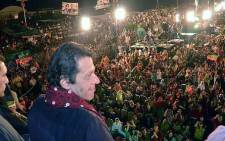 Chairman of Pakistan's Tehreek-e-Insaaf party (PTI), Imran Khan, addresses thousands of people at Azadi Square outside the country's Parliament in August 2014. Picture: Official PTI Facebook page.