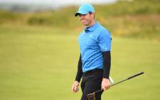 Northern Ireland's Rory McIlroy reacts on the 10th green during the first round of the British Open golf Championships at Royal Portrush golf club in Northern Ireland on 18 July 2019. Picture: AFP