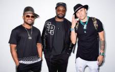 A screengrab of The Black Eyed Peas members, from left, apl.de.ap, will.i.am and Taboo. Picture: Twitter/@bep.