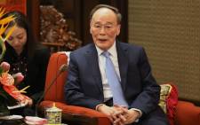 FILE: Chinese Vice President Wang Qishan meets with chairman of the National Security Council of Kazakhstan Karim Masssimov (not seen) at Zhongnanhai in Beijing on 8 April 2019. Picture: AFP