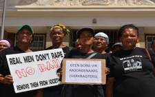 Women protested outside the Bredasdorp Magistrate's Court on 26 February 2012, where a man accused of raping and murdering Anene Booysen appeared.  Picture: Renee de Villiers/EWN