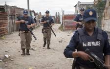 Metro Police patrol Vrygrond after residents hurled rocks at police during taxi violence in the area. Picture: Thomas Holder/EWN