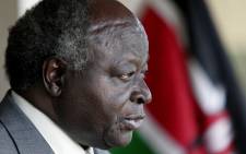 In this file photo taken on 3 January 2008 Kenyan President Mwai Kibaki reads a statement to members of the press in Nairobi. Former Kenyan President Mwai Kibaki, who led the East African country for more than a decade, died on 22 April 2022, his successor Uhuru Kenyatta announced. He was 90. Picture: AFP