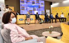 Basic Education Minister Angie Motshekga (L) and some top performers on the stage on 22 February 2021 at the announcement of the 2020 matric results. Picture: GCIS.