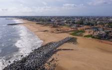 This aerial view shows a groyne - a shore protection structure - on a beach east of Cotonou, Benin on 23 October 2023. Picture: Yanick Folly/AFP
