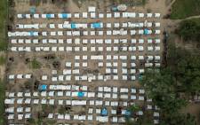 An aerial view of temporary houses in the Napala Agrarian Center of Metuge District, Cabo Delgado, northern Mozambique, on 24 February 2021. The place functions as a centre for displaced people who fled their communities due to attacks by armed insurgents in the northern area of Cabo Delgado's province. Picture: Alfredo Zuniga/AFP