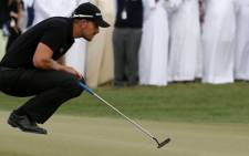 Sweden’s Henrik Stenson plays a shot during the final round of the DP World Tour Golf Championship in the Gulf emirate of Dubai on 17 November 2013. Picture: AFP
