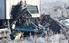 This picture taken on 13 December 2018 shows the train's wreckage after a high-speed train crashed into a locomotive in Ankara. Nine people were killed and nearly 50 injured in this train accident. Picture: AFP