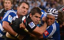 FILE: Sharks scrumhalf Cobus Reinach on the attack against the Stormers in 2013. Picture: Aletta Gardner/EWN.