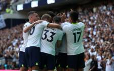 Tottenham players celebrate with Tottenham Hotspur's English defender Eric Dier, after he scores their second goal during the English Premier League football match between Tottenham Hotspur and Southampton at Tottenham Hotspur Stadium in London, on 6 August 2022. Picture: CHRIS RADBURN/AFP