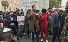 Students outside Parliament want government to respond to their call for amnesty for those arrested during the Fees Must Fall protests. Picture: Kaylynn Palm/EWN.