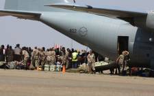 The plane carrying 26 South Africans, including three children, who were injured in the Lagos building collapse more than week ago has landed at the Swartkop Air Force Base in Pretoria on 22 September 2014. Picture: Christa Eybers/EWN
