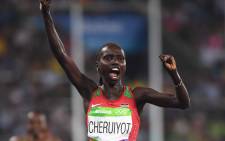 FILE: Kenya's Vivian Cheruiyot celebrates victory in the Women's 5000m Olympic final at the Rio 2016 Olympic Games at the Olympic Stadium in Rio de Janeiro on August 19, 2016. Picture: AFP