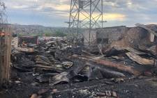 Alexandra residents are trying to salvage what is left after a fire swept through the informal settlement on 6 December 2018. Picture: EWN